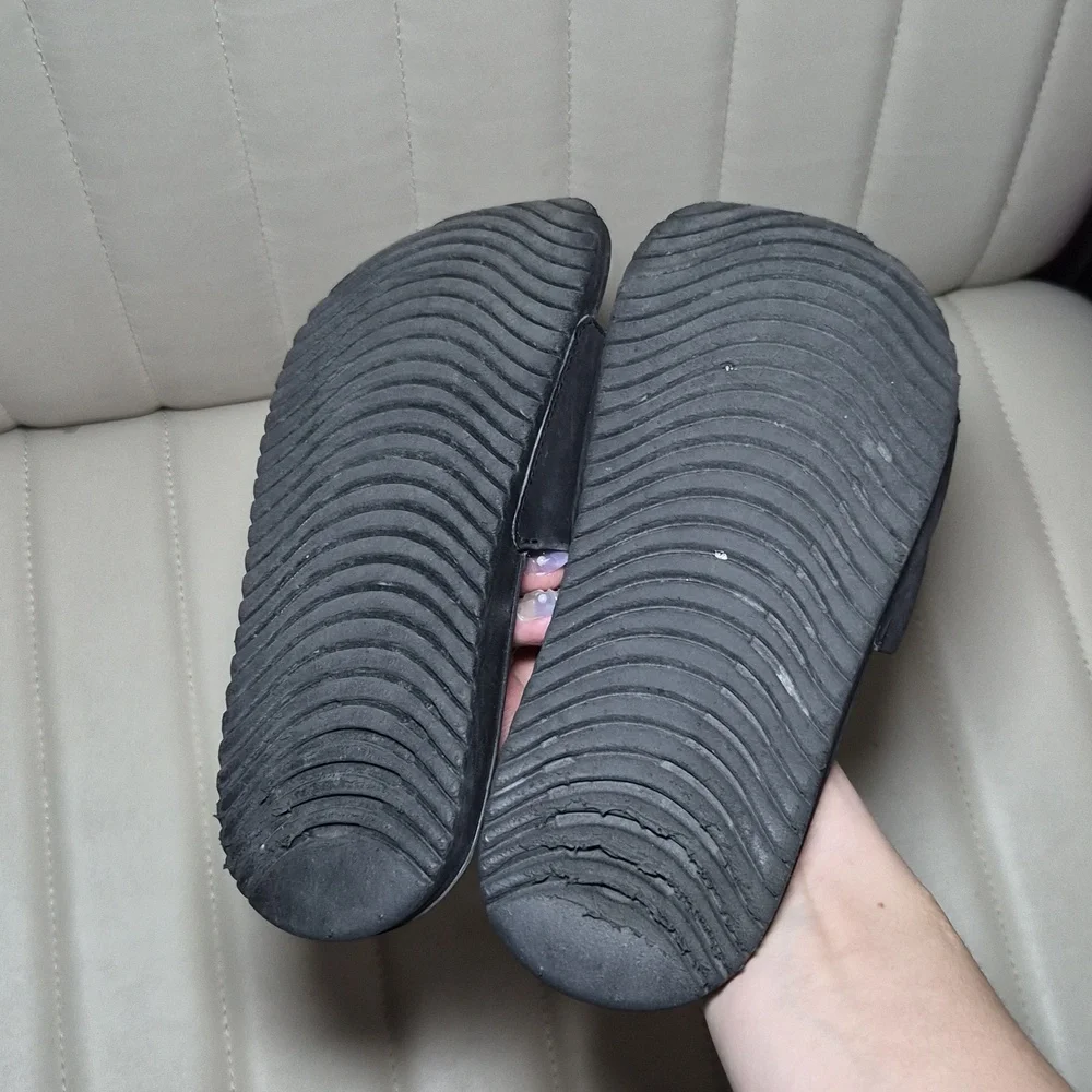 Nike Black Slides with Gold Swoosh 2Y